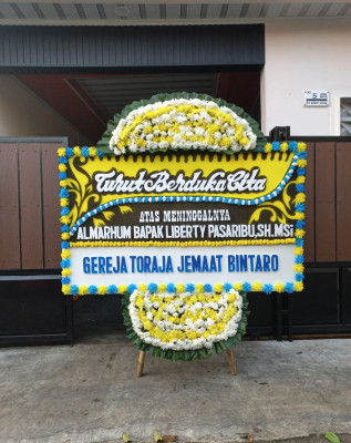 Papan Bunga Duka di Kotakulon